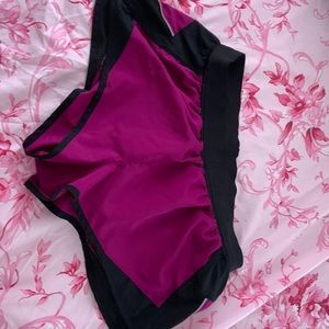 purple and black Victoria sport shorts, size medium